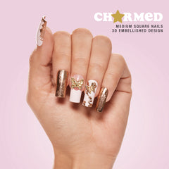 SP NAIL 418 CHARMED GOLD BUTTERFLY displayed on hand model 