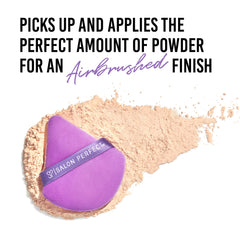 Purple makeup sponge with 'Salon Perfect' branding on a white background with text about powder application.