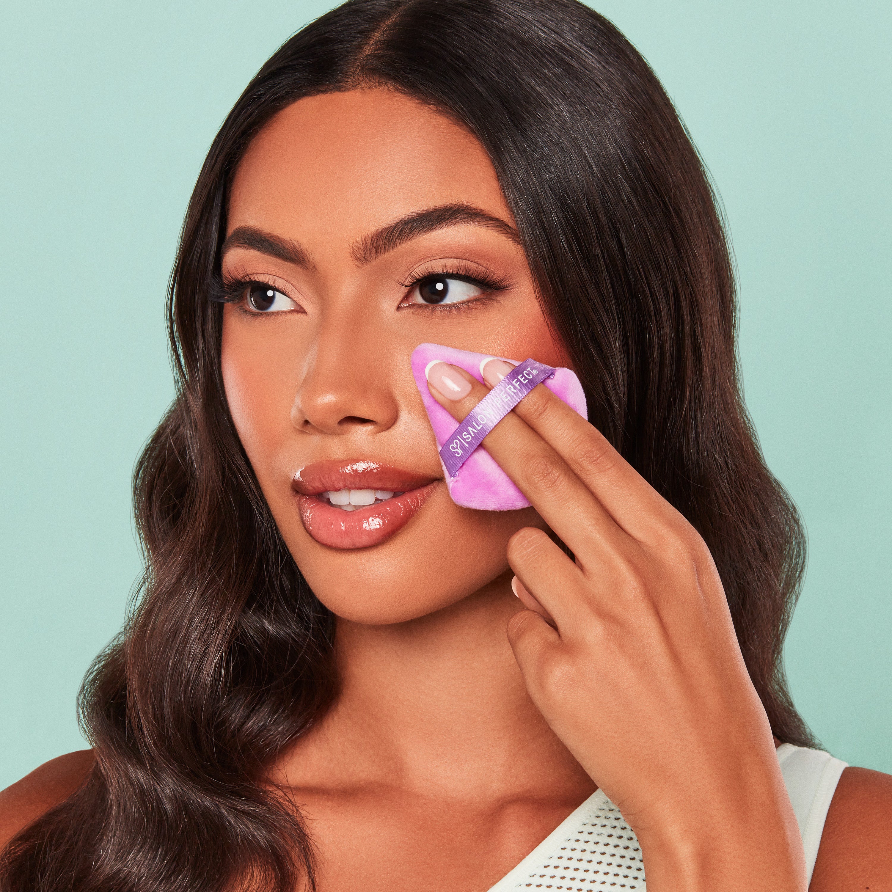 Close-up of Salon Perfect Powder Puff in the under eye.